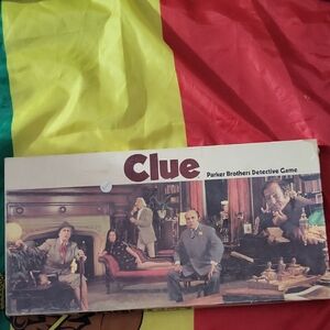 Clue Detective Board Game - Classic Red and Yellow